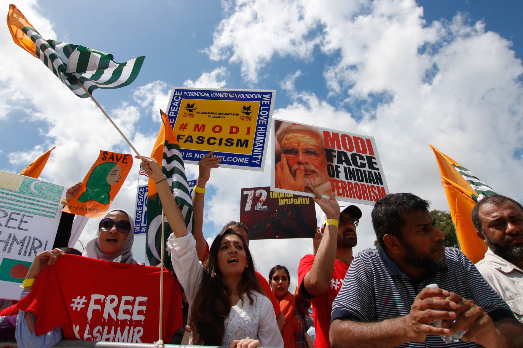 Protesters rally outside President Donald Trump, Indian Prime Minister Narendra Modi summit in Houston